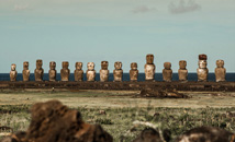 Front of 15 moai statues of Ahu Tongariki with ocean in background
