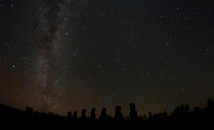 Starry sky above Ahu Akivi with Milky Way visible at Rapa Nui (Easter Island)