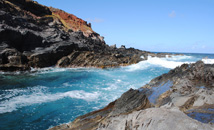 Colorful ocean and rocks with curves in Vinapu area, Easter Island (Rapa Nui)