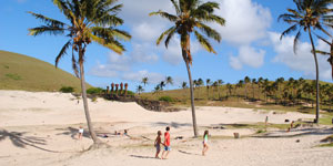 Anakena beach with palm trees and moai statues