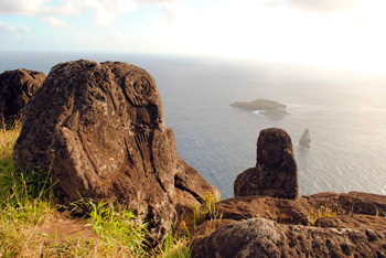 Birdman petroglyphs and view over Motu Nui from Orongo.