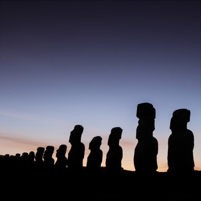 Silhouettes of moais of Ahu Tongariki at sunrise