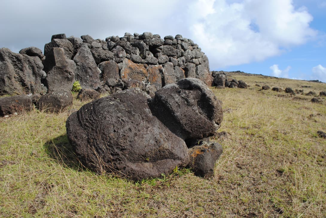 Moai statue of black basaltic rock at north coast
