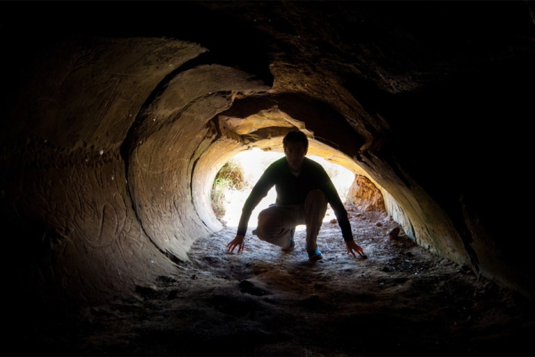 Exploring Ana O Keke Cave during a visit to Rapa Nui.