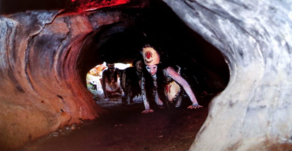Local women representing the sacred legend of the Neru virgins at the Ana o Keke cave.