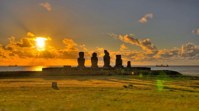 Sunset behind Ahu Vai Uri at Tahai on Easter Island.