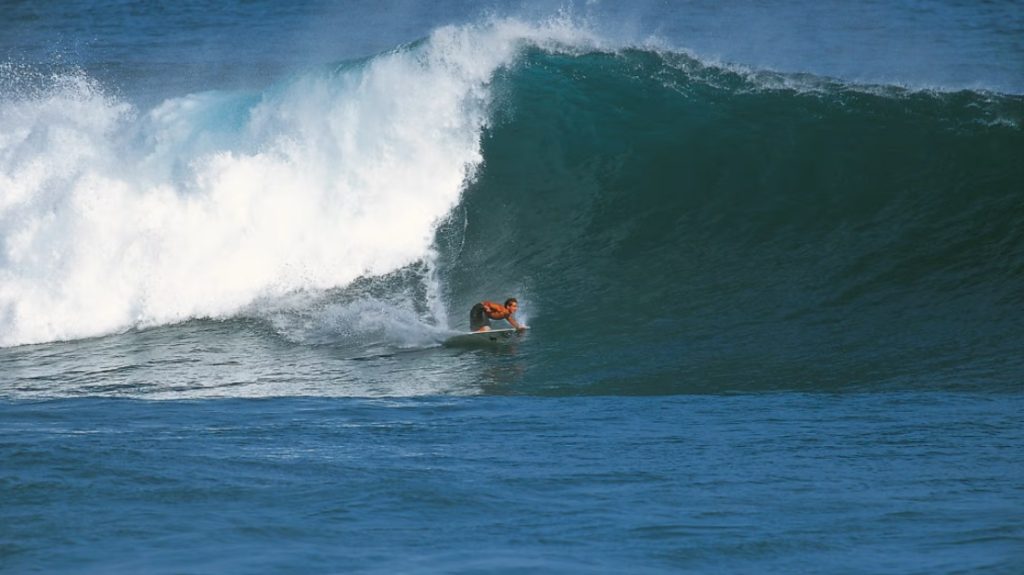 A massive, powerful, barreling wave breaking during the ideal season for surfing on Easter Island (Rapa Nui).