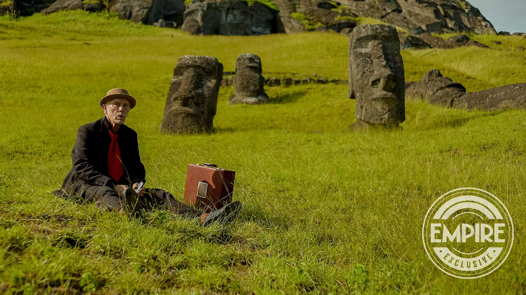 John Malkovich in the Rano Raraku quarry surrounded by moai statues in Wild Horse Nine