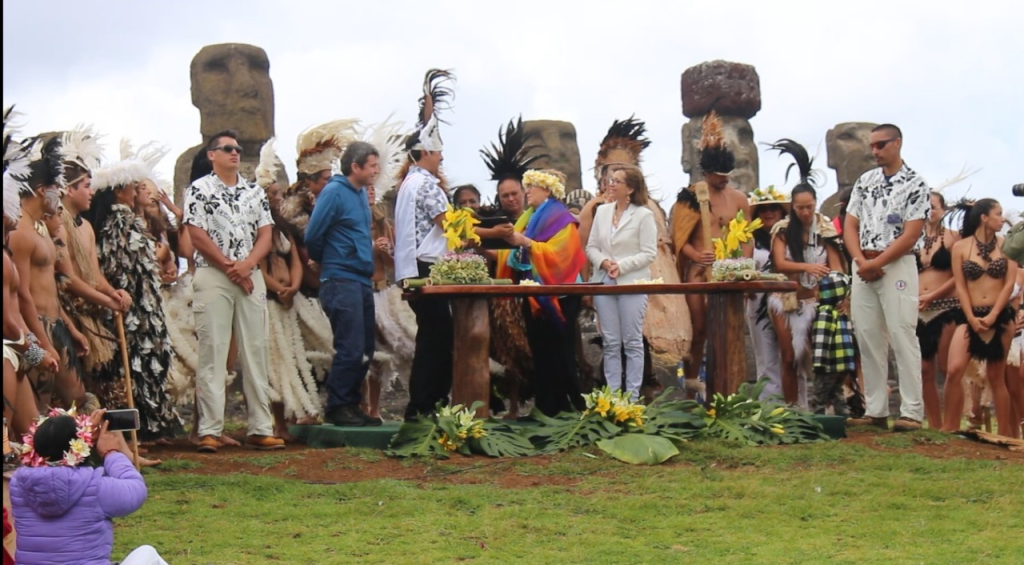 Former Chilean President Michelle Bachelet with the Ma'u Henua Indigenous Community in front of Ahu Tongariki in Rapa Nui.