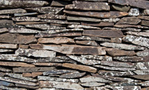 Stone texture of basalt slab hare keho houses at Orongo