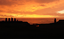 Moai statue silhouettes at sunset, Tahai