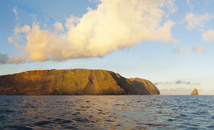 Easter Island and Motu Kao-Kao from ocean by sunset