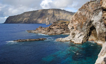 Colorful ocean at Motu Nui with Motu Iti, Motu Kao-Kao and Rapa Nui (Easter Island) in background