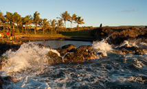 Waves crashing into rock barrier at Poko-Poko pool, Hanga Roa, Easter Island