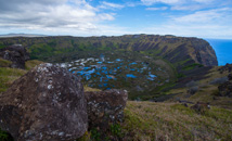 Rano Raraku crater lake panorama with blue sky