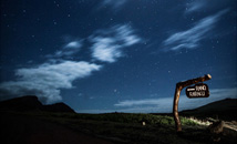 Rano Raraku sign at night with stars and moon