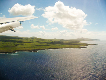 Easter Island aerial view with airplane wing.